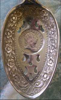 spoon 3 pence british coin