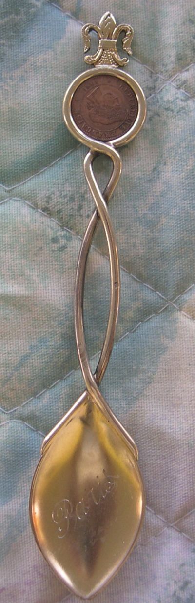 France 1 centime coin spoon