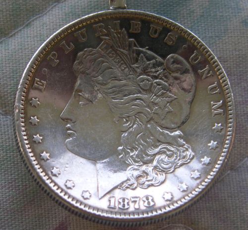 spoon US silver dollar