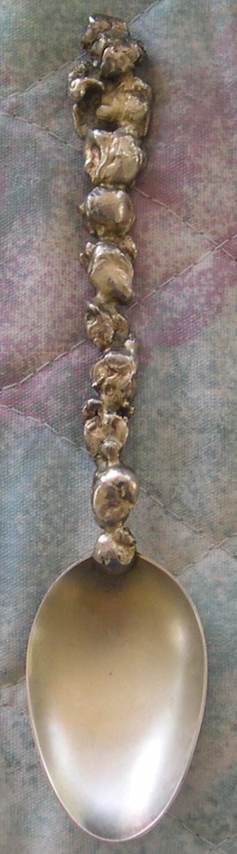 artificial gold nugget spoon